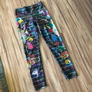 Terez fun Lisa frank-esque print leggings